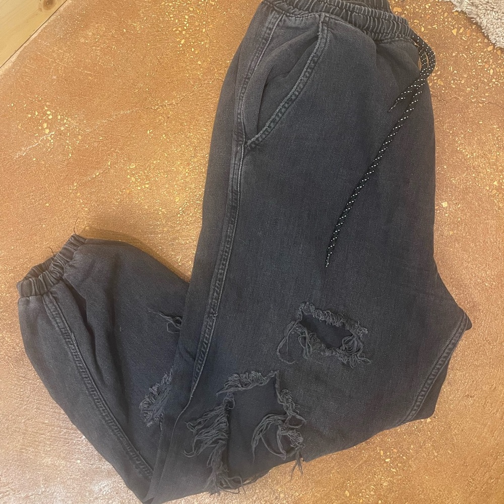 Free People distressed denim joggers